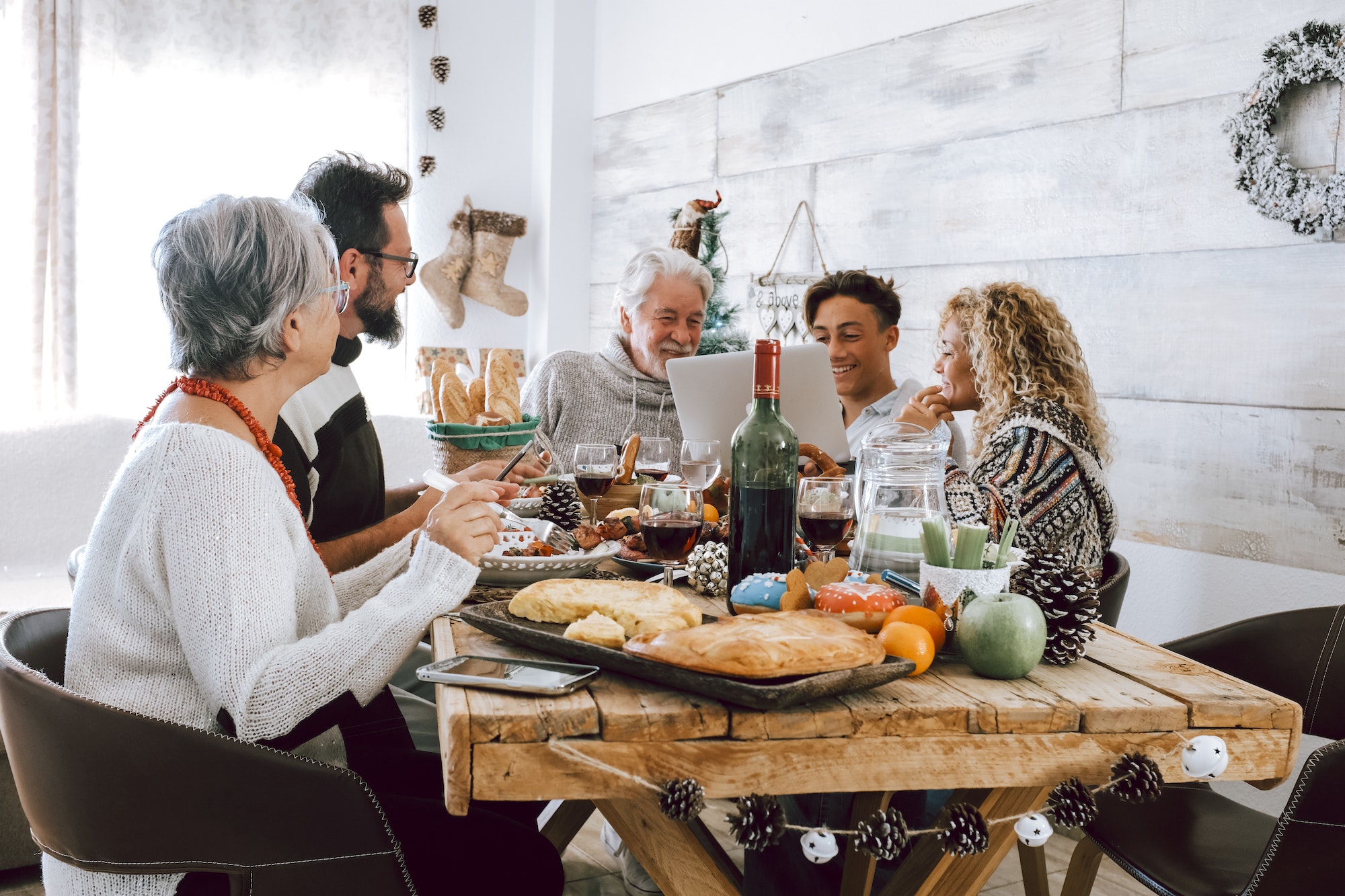 Family enjoy together christmas lunch at home
